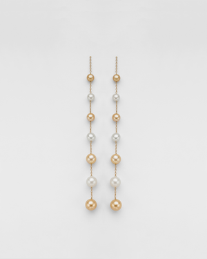 GOLDEN IVORY PEARL SHOULDER DUSTER EARRINGS